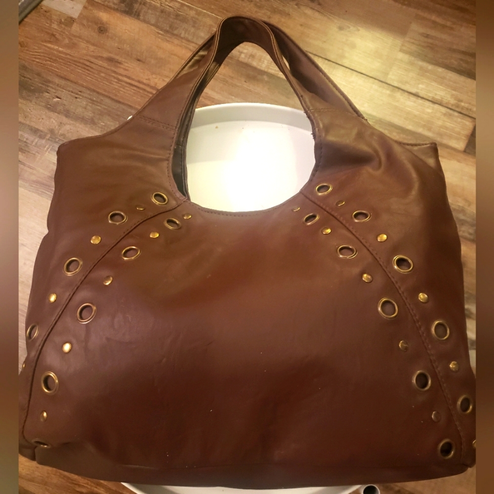 Nice Avon Brown with Metal Grommets Shoulder Bag.  FF66